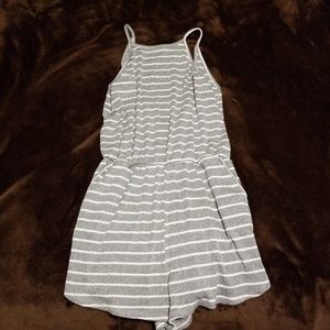 Striped romper with pockets.